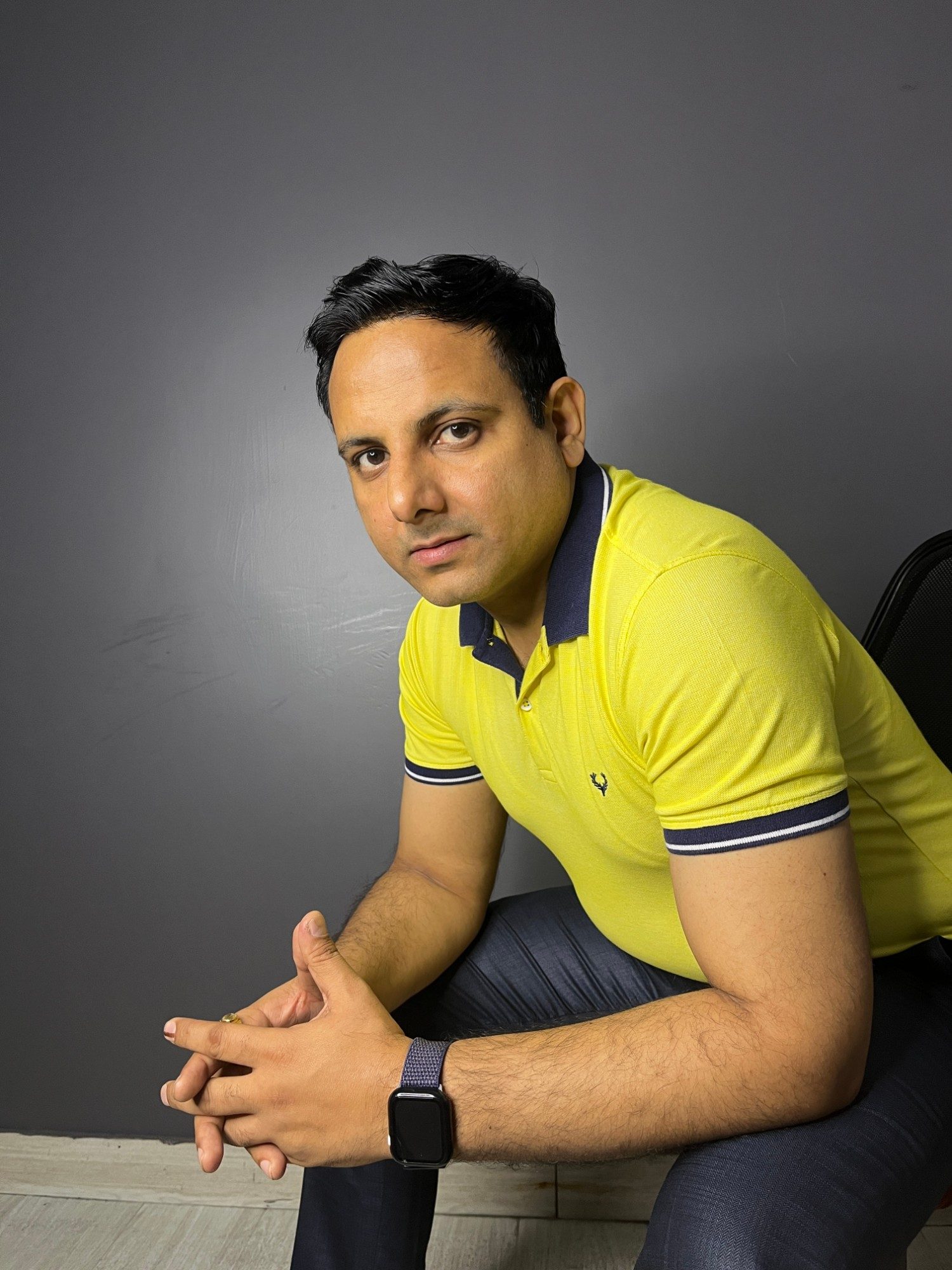 Gaurav Singhal in a yellow polo shirt